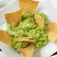 Large Guacamole & Chips. · Our family recipe, Cantaritto's dip made from the best avocado. Mix with onions, cilantro an...