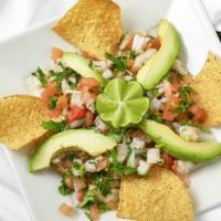 Shrimp Ceviche. · Most Popular. Fresh shrimp marinated in lime juice. Mixed with onions, tomatoes, cilantro (P...