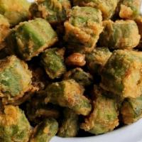 Fried Okra · An Oklahoma favorite! breaded with a traditional, cornmeal coating. Served with ranch dressi...