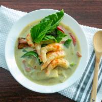 Green Curry · Gluten free. Green chili paste with coconut milk, basil, bell pepper, eggplant and bamboo sh...