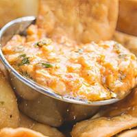 Pita Chips/Dip · Seasoned Homemade Pita chips with your choice of sauce on the side