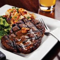 New York Strip · Aged Hand-cut USDA Choice 12 oz Strip seasoned and grilled to perfection. Topped with our si...
