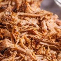 Kalua Pork Buns (2) · Shredded hawaiian style pork. Drizzled with BBQ sauce, topped with fried onions.