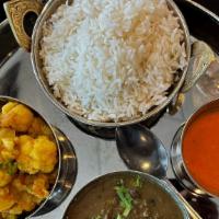 Nepali Thali (Vegetarian) · Sampling of typical vegetarian dishes from the Himalayan mountains of Nepal (includes Rice, ...