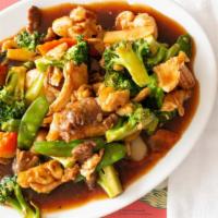 Triple Delight · Beef, chicken and shrimp with vegetables.