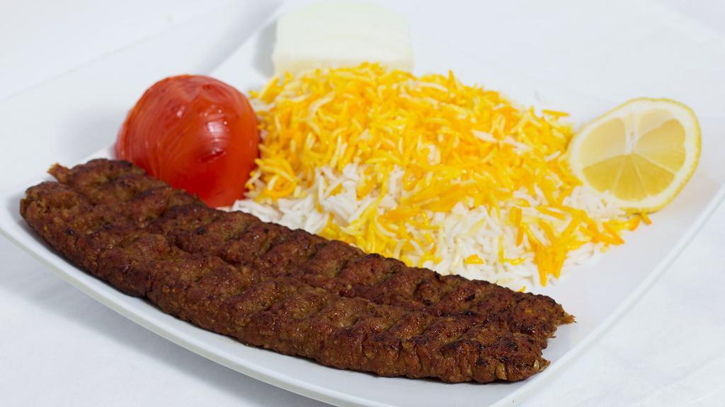 Koobideh Kabob · Two skewers of grilled ground beef, grilled tomatoes and served with basmati rice or pita bread.