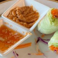 Thai Salad Rolls · Choice of chicken, tofu or shrimp with fresh vegetables and herbs rolled in rice paper, serv...