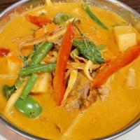 Roasted Duck Curry · Roasted duck in a red curry with coconut milk, tomatoes, bamboo shoots, pineapple, bell pepp...