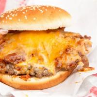 York St · One 1/3 lb. beef burger served chili, melted cheddar cheese, bacon and grilled onions  on ou...