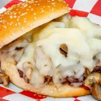 Mushroom & Swiss · One 1/3 lb. beef burger served with melted Swiss cheese and sautéed mushrooms  on our new br...