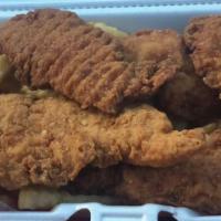 Chicken Finger Basket · Breaded chicken tenders (four pcs per order). Served with fries and one side of BBQ, ranch o...