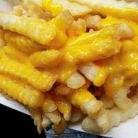 Cheese Fries · Crinkle fries lightly salted and covered in melted cheese.