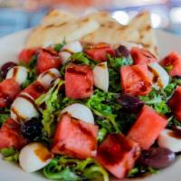 Greek Salad · ROMAINE LETTUCE, CUCUMBER, TOMATO, KALAMATA OLIVES,
BEETS, PEPPERONCINI, FETA, AND RED ONION.