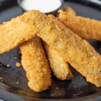Fried Pickle Spears · Lightly breaded dill pickle spears.  Served with our made  from scratch house ranch.