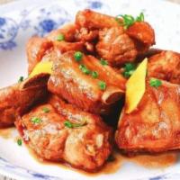 Spare Ribs Braised With Brown Sauce(紅燒排骨) · Slow-braising caramelized cubes of pork Baby ribs