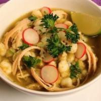 Pozole Verde · Gluten free. Green salsa soup with white corn. Traditional Mexican soup made with green sals...