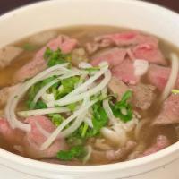 Beef Pho (Large) · Beef rice noodle soup with your choice of meat.
