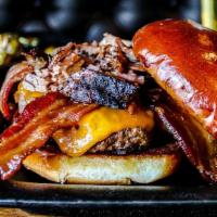 Bacon Brisket Burger · Fresh grilled patty topped with cheddar cheese, bacon, smoked brisket