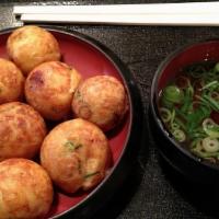 Takoyaki App (6) · kind of dumpling, made from grilled puffs of seasoned batter with a small piece of octopus m...