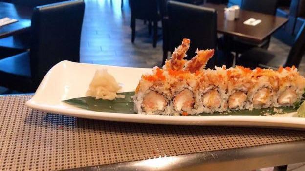 House Special Roll · Spicy. Holiday Roll Wrapped ,  Top w. Tempura Shrimp .)   Served w. Spicy Mayo & Eel Sauce & Crunchy ,Fish Eggs ( Masago )