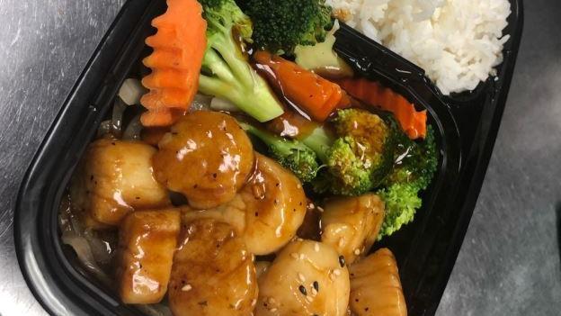 Scallop Teriyaki · Cooked Onion  , Broccoli.  Carrots ,Teriyaki ,Scallop  ,  Steamed White Rice , Clear Soup & Salad w. House Special Dressing.