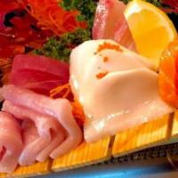 Sashimi Deluxe · Served with miso soup. 13 pieces assorted fish.