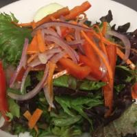 Insalata Primavera · Mixed greens, sliced Roma tomatoes, red onions, cucumber, red pepper, julienne carrots tosse...