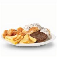 Hardee Breakfast Platter®  · Made From Scratch Biscuit ‘N’ Gravy™, 2 folded eggs, Hash Rounds® and a choice of: Bacon, Sa...