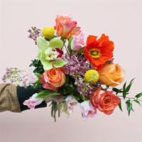 Slice Of Paradise Wrapped Bouquet · A medium scale wrapped bouquet that blends romance, joy, and texture in the most intentional...