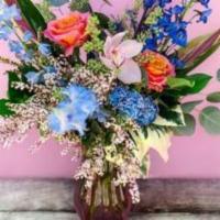 Eclectic Symphony · The perfect harmony between a bold complimentary color pallet and delicate floral textures. ...