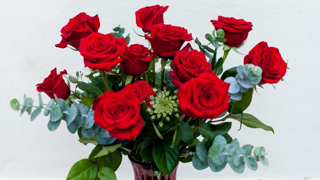 Mixed Colored Rose Dozen · The beautiful, brilliant, and luscious mixed colored rose dozen vase arrangement is a Valentine's Day necessity. Perfectly showy, classy, and sophisticated it hits all the marks for the perfect 
