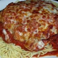 Baked Spaghetti · Home made meat sauce smothered in a mountain of noodles covered with mozzarella cheese and b...