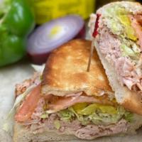 Turkey · Oven roasted turkey and provolone cheese. All sandwiches come with lettuce, onion, tomatoes,...