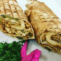 Chicken Shawarma Sandwich · chicken, garlic sauce, and pickles rolled in pita bread