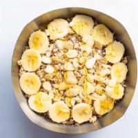 Nutty Bowl · Base blend: organic açaí, almond milk, apple juice, peanut butter, bananas, strawberries, fl...