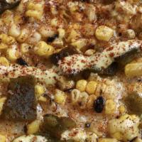 Vegan Elote · ​The classic Mexican street food, on a pizza—and make it vegan! Fresh roasted corn, poblano ...
