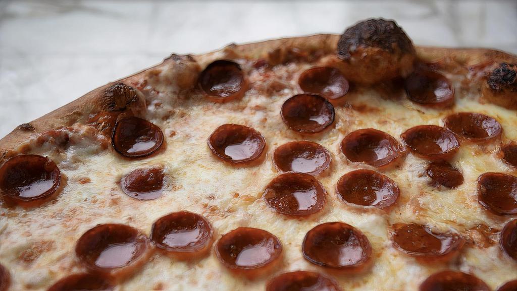 Pepperoni · Our marinara base topped with mozzarella and plenty of ezzo pepperoni cups, cute and built to char!