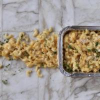 Baked Mac N Cheese · Mac noodles tossed in our four-cheese mac blend, then topped with parmesan and panko bread c...