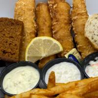Classic Fish Fry (4 Pcs) · Beer battered cod with sides of coleslaw, fries, macaroni salad, rye bread and tartar sauce.
