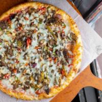 Philly Steak Pizza · Steak, Mushrooms, Green Peppers, Onions, Mozzarella, and Provolone Cheese.