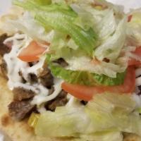 Lamb Gyro · Delicious lamb meat with cheese, Tzatziki sauce, Tomatoes, Onions, Banana pepper, and Lettuce.