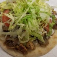 Castello Gyro · Mix lamb and chicken with cheese, Tzatziki sauce, Tomatoes, Onions, Banana Peppers, and Lett...