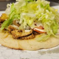 Teriyaki Chicken Gyro · Grilled Chicken with Teriyaki Sauce, Onion, Tomatoes, Lettuce, and Cheese.