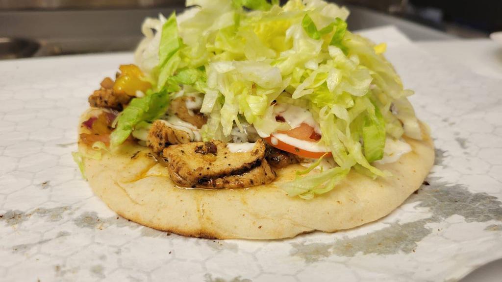 Chicken Philly Gyro · Grilled Chicken with Tzatziki sauce, Mushrooms, Green Peppers, Onions, Tomatoes, Cheese, and Lettuce.