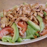Grilled Chicken Salad · Lettuce, tomatoes, avocado, onions, bell pepper and shredded carrots.