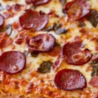 Meat Lover'S Pizza 12 Inch · Pepperoni, Italian sausage, ground beef, turkey ham, and beef bacon.