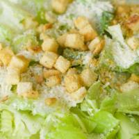 Caesar Salad · Romaine lettuce, shredded Parmesan, and croutons.