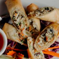 Thai Egg Rolls (3) · Chicken, bean thread noodles, carrots, cabbage, and mushrooms hand-rolled in a wonton skin. ...