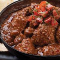 Chicken Karahi · Chicken cooked in special sauce seasoned with spices, tomatoes, chicken cooked in special sa...
