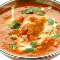 Chicken Korma · Boneless chicken cooked with tangy sauce and spices.